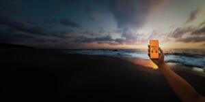 Phone On Beach 1 Fennemore Forward